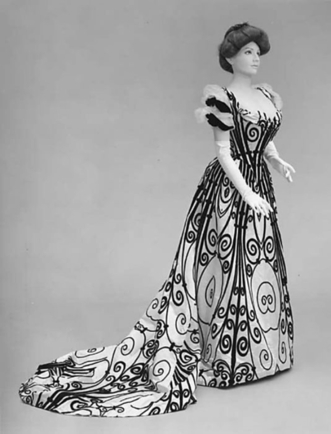 Teagown. From 1900 women wore a less formal dress at home, also called a  teagown. The model on display here is called a robe princesse and follows  the curves of the body